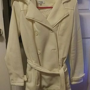 Cream pea coat style. Fuzzy inside.